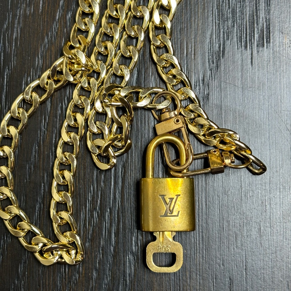 Louis Vuitton Gold Lock and key with unbranded bag strap lock #308